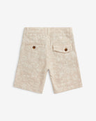 Back view of Linen Ivory Garden Trouser Short featuring button pockets and floral texture.