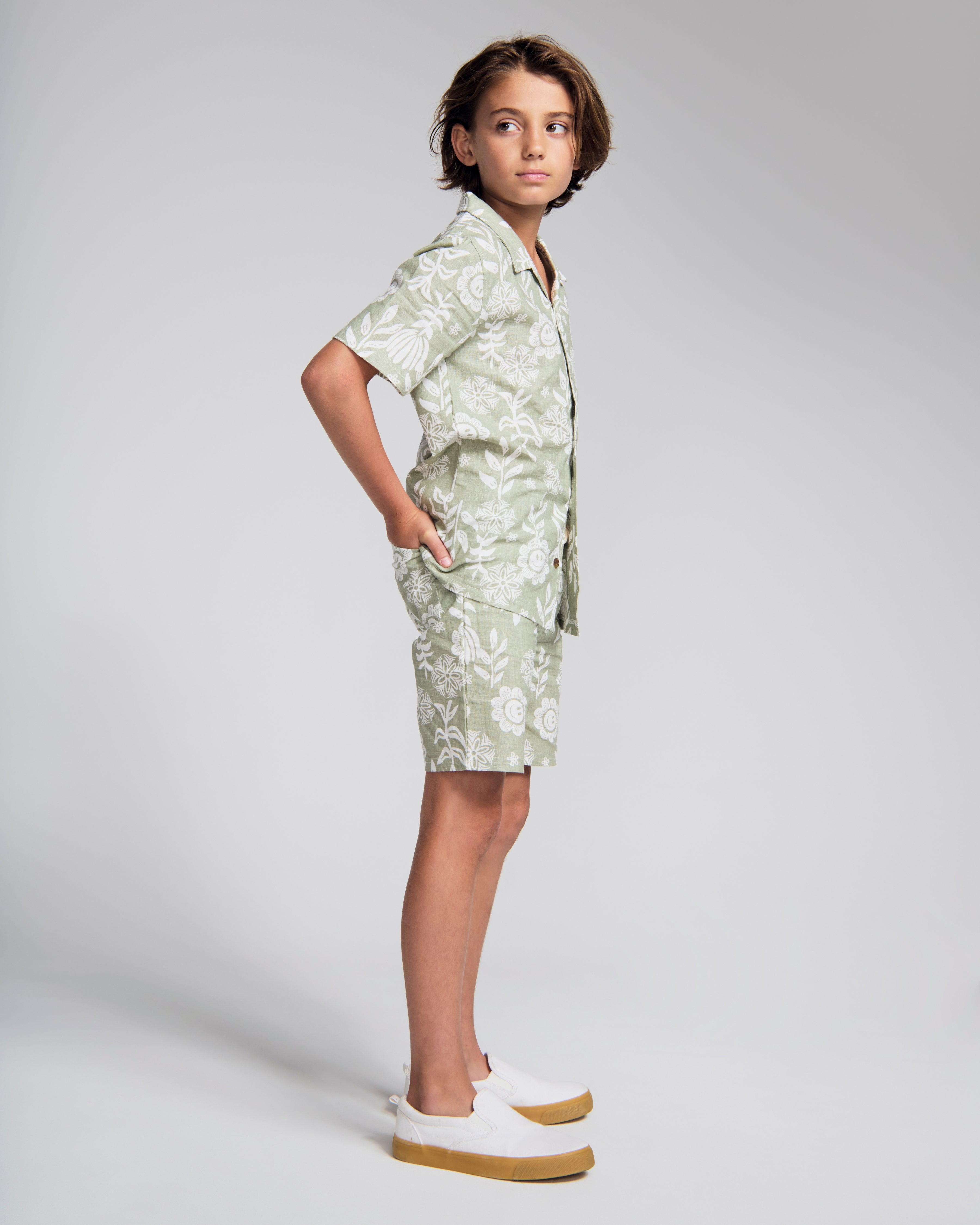 Linen Sage Sunflower Camp Collar Shirt styled with matching shorts, perfect for warm weather outings.
