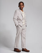 Linen Warm Grey Sports Jacket worn by a boy, showcasing timeless style and comfort in a formal setting.