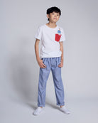 Nautical Stripe Resort Pant modeled by a young boy, featuring a casual white shirt and blue and white stripes.