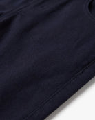 Close-up of Navy Blue Commuter Twill Pants showing soft twill fabric and detailed stitching.