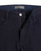 Navy Blue Commuter Twill Pants close-up view showing zip fly and button closure.