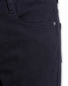 Close-up of Navy Blue Commuter Twill Pants showcasing fabric and front pocket details.