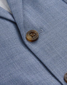 Close-up of the Pacific Blue Stretchy Mod Suit jacket with lapel collar and button detail.
