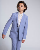 Pacific Blue Stretchy Mod Suit model wearing tailored jacket and skinny leg pants in a stylish pose.