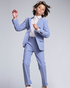 Boy wearing Pacific Blue Stretchy Mod Suit Pant with stylish suit jacket, perfect for celebrations and all-day comfort.