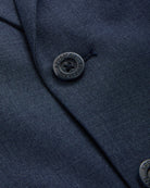 Close-up of the Peacoat Stretchy Mod Suit jacket showing buttons and fabric texture.