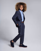 Boy wearing a Peacoat Stretchy Mod Suit with a lined jacket and skinny-leg pants, styled for a special occasion.