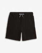 Black shorts with a drawstring on a light gray background