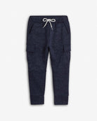 Navy blue cargo jogger pants with a white drawstring on a white background