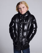 Glitter Black Slim Puffy Coat worn by girl, showcasing a shiny black finish and cozy design, perfect for chilly days.