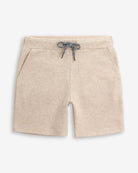 Sandshell Resort Short in beige with functional drawstring and front pockets for kids.