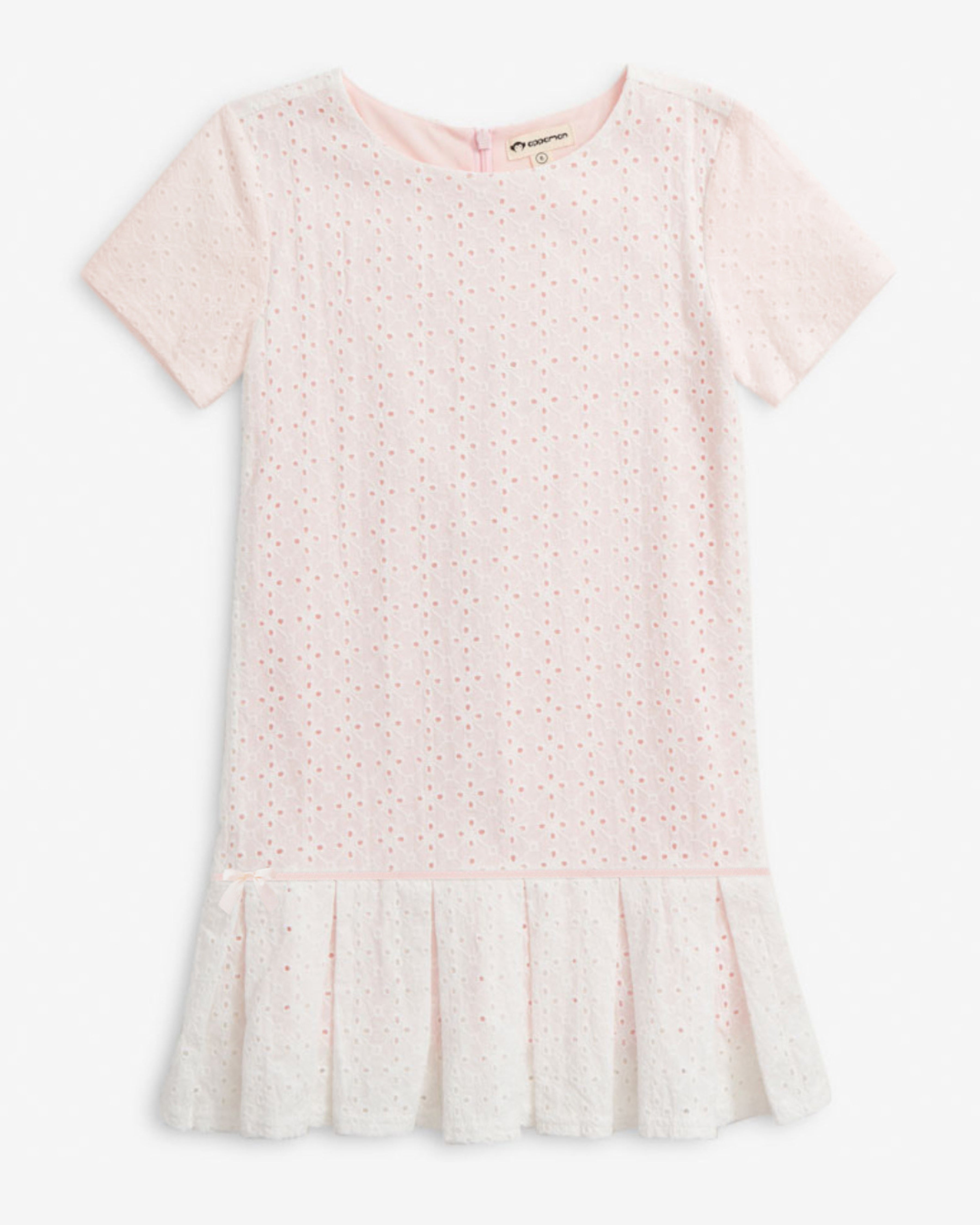 Soft Pink Eyelet Eve Dress featuring short sleeves and pleated skirt in airy eyelet fabric.