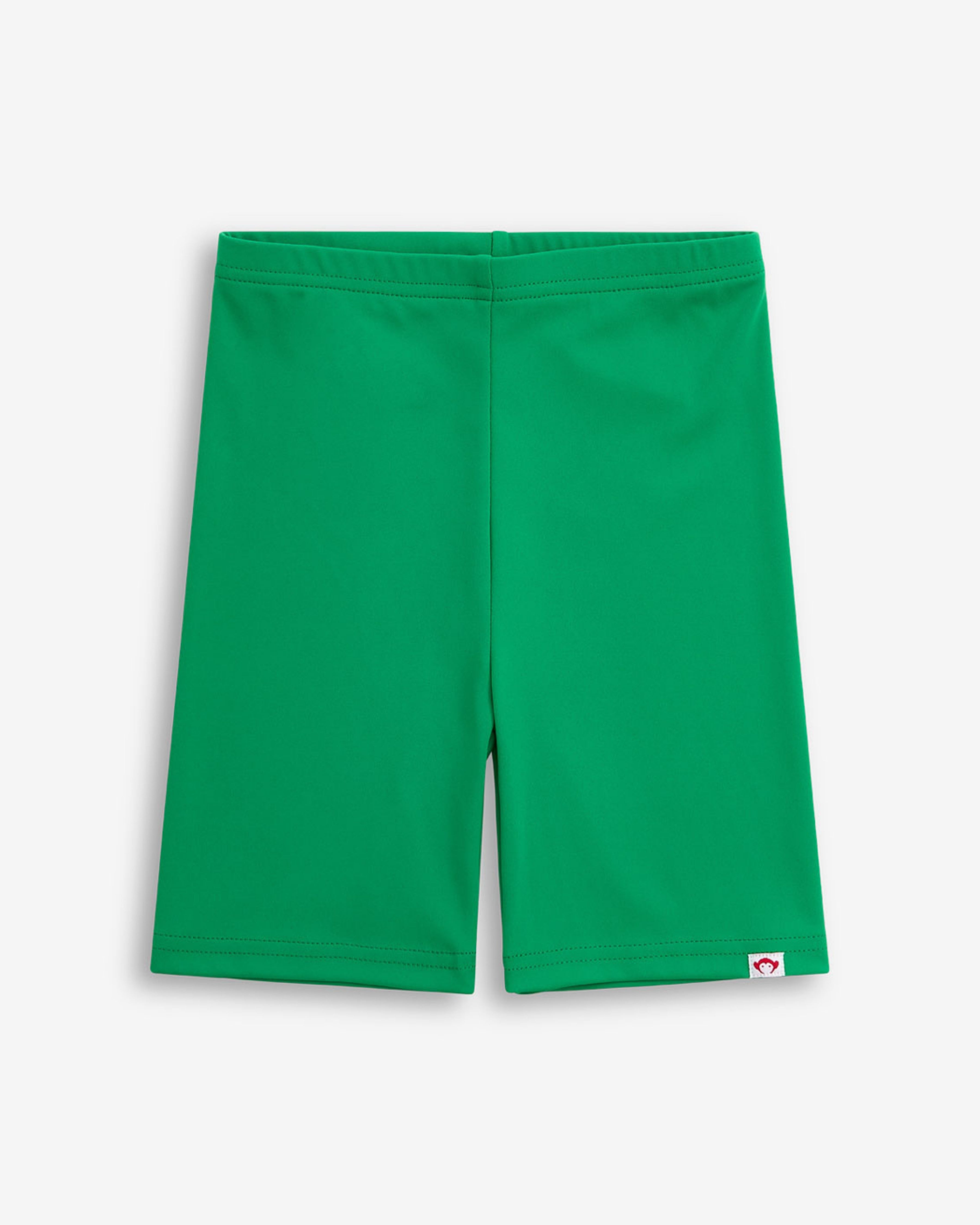 Tropical Green Biker Short featuring a stretchy, comfortable fabric perfect for summer play.