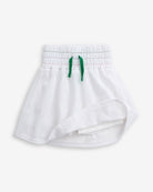 White Terry Laney Skort featuring a smocked waistband and tie front bow detail, perfect for active days.