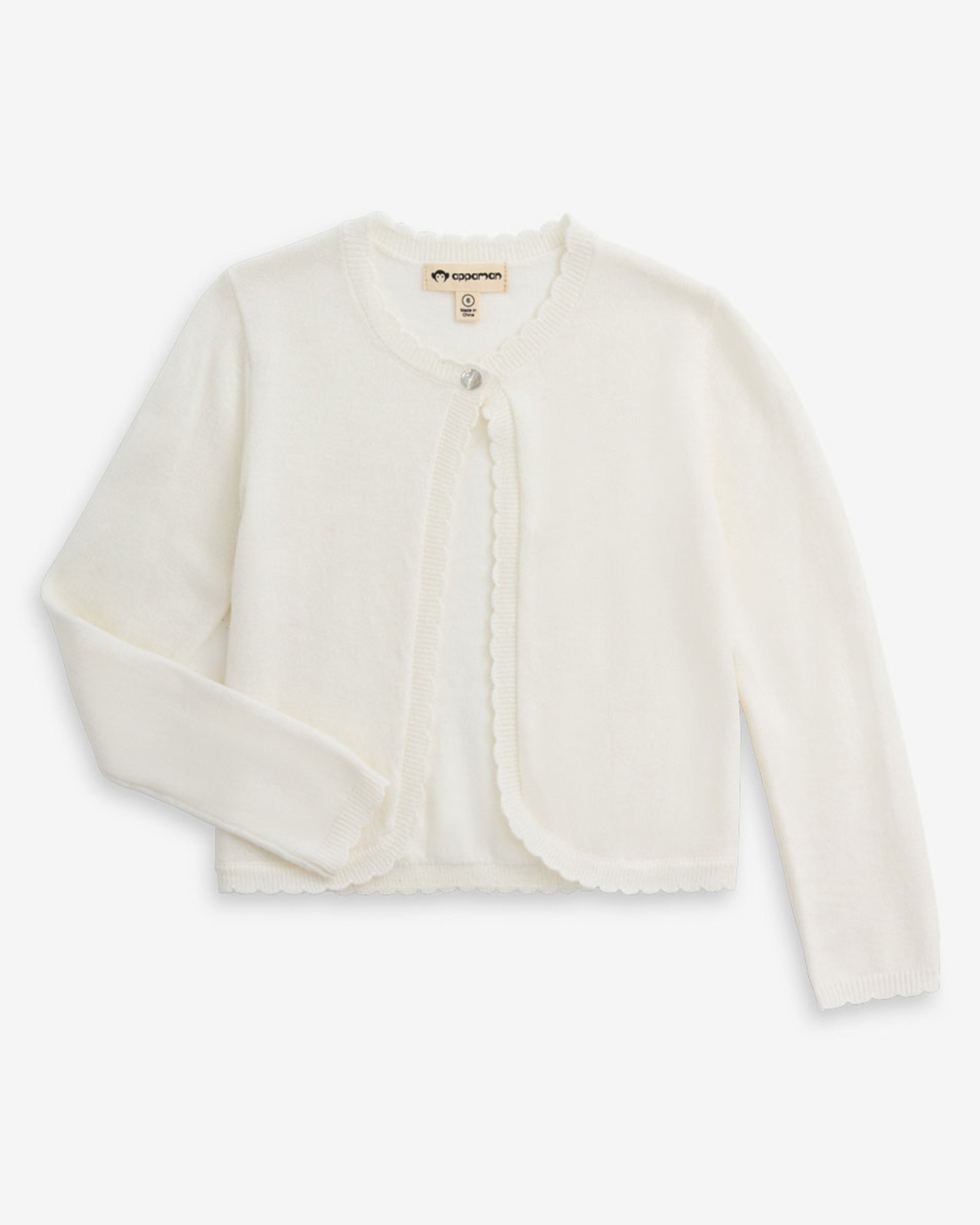 White Bolero Cardigan featuring soft knit and scallop detailing, ideal for layering with dresses in spring and summer.