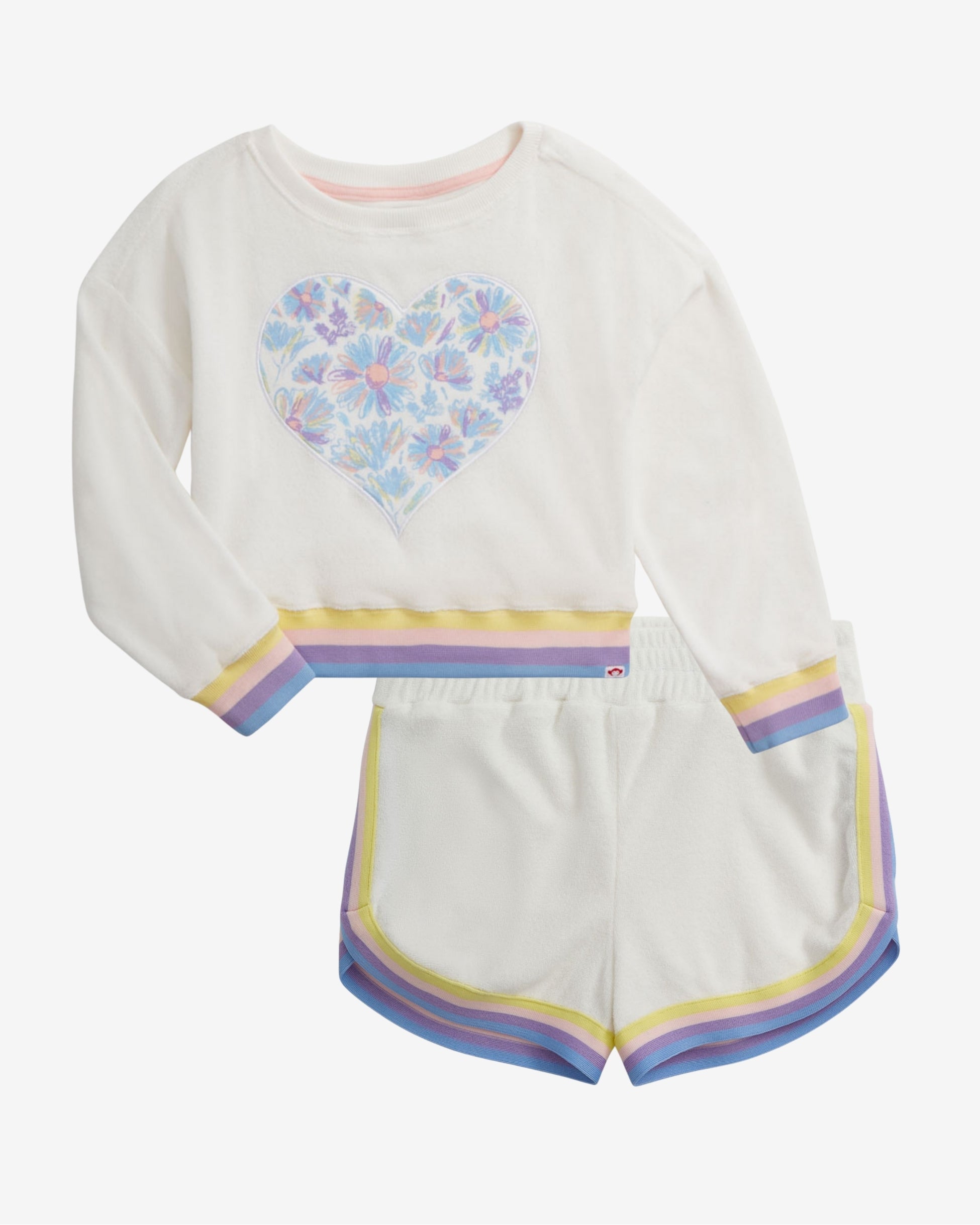 Children's outfit with floral heart design on a white background