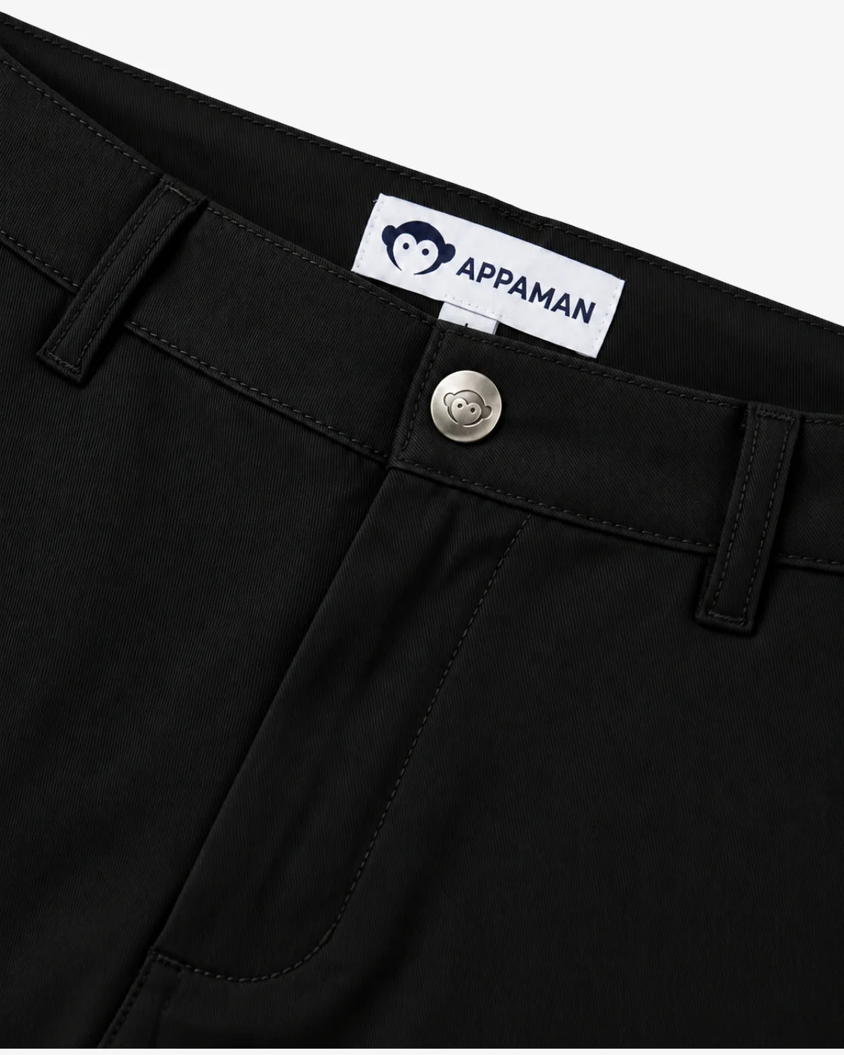 Appaman boys' commuter twill pants in black, close-up of waistband detail.