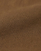 Close-up of the durable twill fabric in warm chipmunk brown for Chipmunk Commuter Twill Pants.