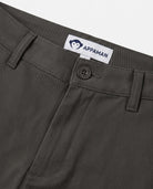 Close-up of Rosin Commuter Twill Pants by Appaman, showcasing button and waistband details.
