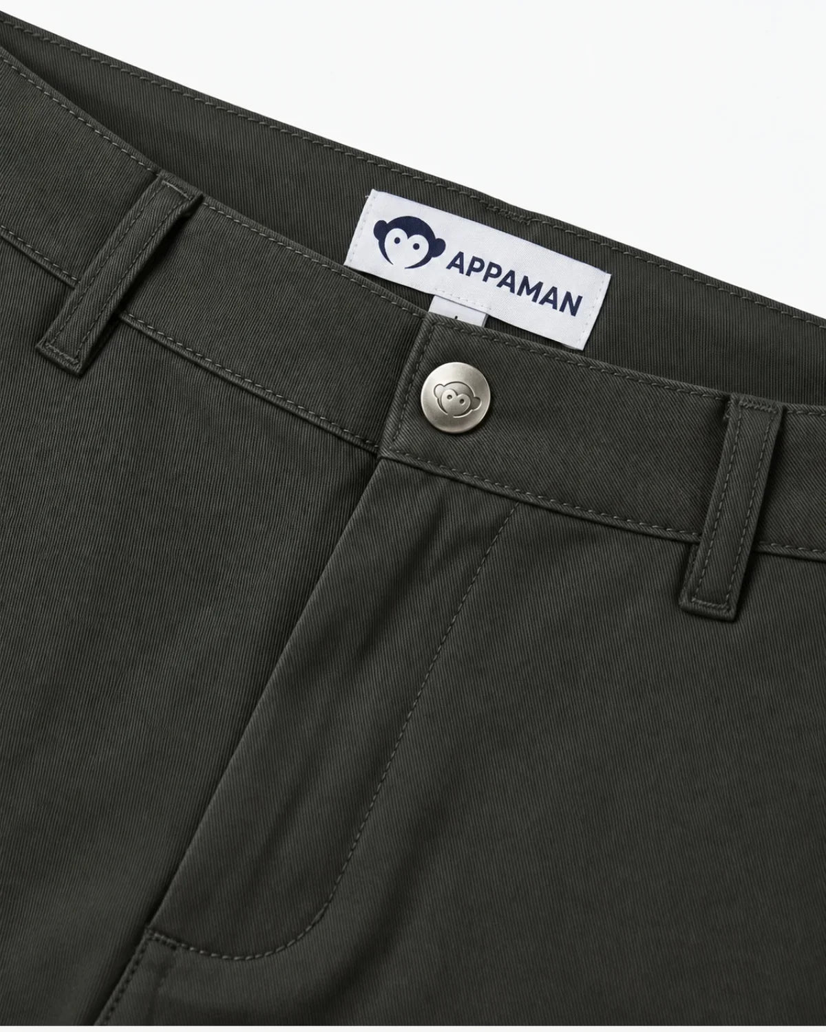 Appaman boys' commuter twill pants in rosin, close-up of waistband detail.