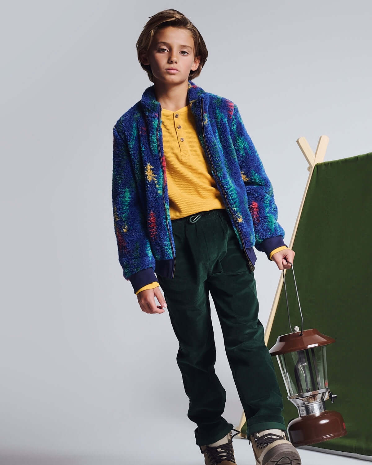 Mustard Craftsman Thermal Henley worn with colorful jacket and green pants, perfect for stylish outdoor adventures.