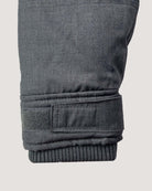 Close-up of the sleeve cuff on a Grey Denali Down Coat featuring ribbed and adjustable design.