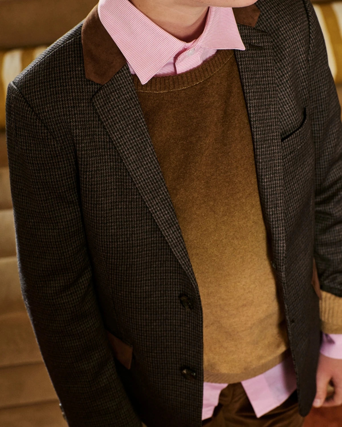 Close-up of a boy wearing a brown tweed blazer. Appaman Fall/Winter 2026 collection.