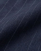 Navy Pinstripe Double Breasted Jacket fabric texture close-up showcasing midweight warmth and tailored lines.