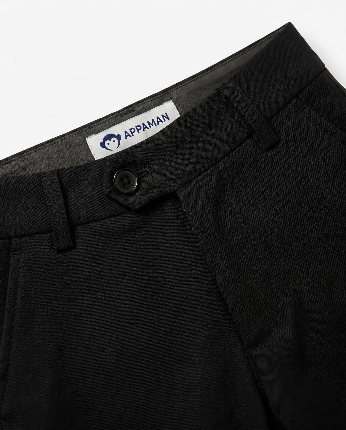 Black Herringbone Everyday Stretch Dress Pants with button and Appaman label, ideal for active kids.