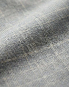 Earth Grey Windowpane Everyday Stretch Pants fabric close-up showing the subtle windowpane pattern.