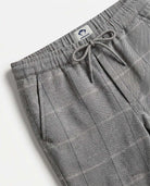 Earth Grey Windowpane Everyday Stretch Pants featuring a subtle check pattern and adjustable waistband for active kids.