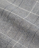 Close-up of Earth Grey Windowpane Everyday Stretch Pants fabric showing texture and subtle windowpane pattern.