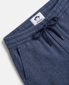 Ink Micro Check Everyday Stretch Pants close-up showcasing the design and adjustable waistband.