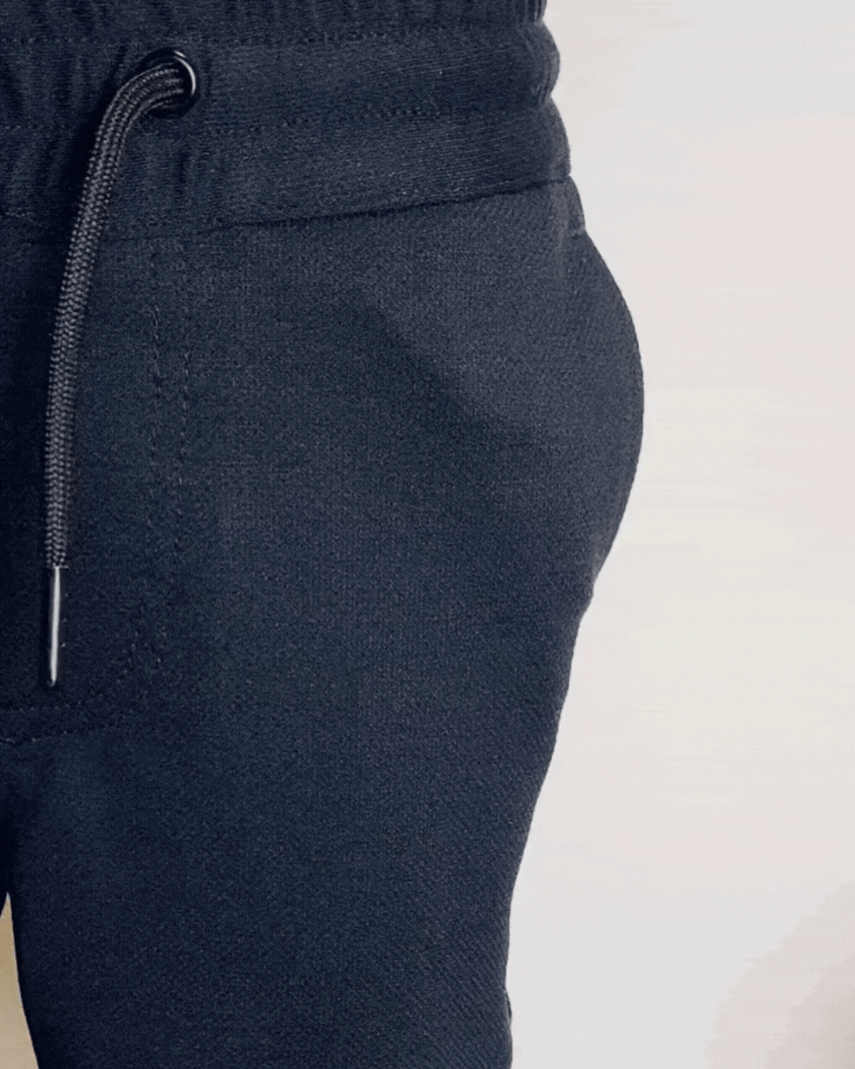 Navy Blue Everyday Stretch Pants featuring a fully functional drawstring and stretchy fabric.