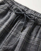 Close-up of the waistband and drawstring of Slate Heather Plaid Everyday Stretch Pants for kids.