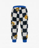Keep Smiling Check Highland Sweatpants with fun check print and blue waistband for boys.