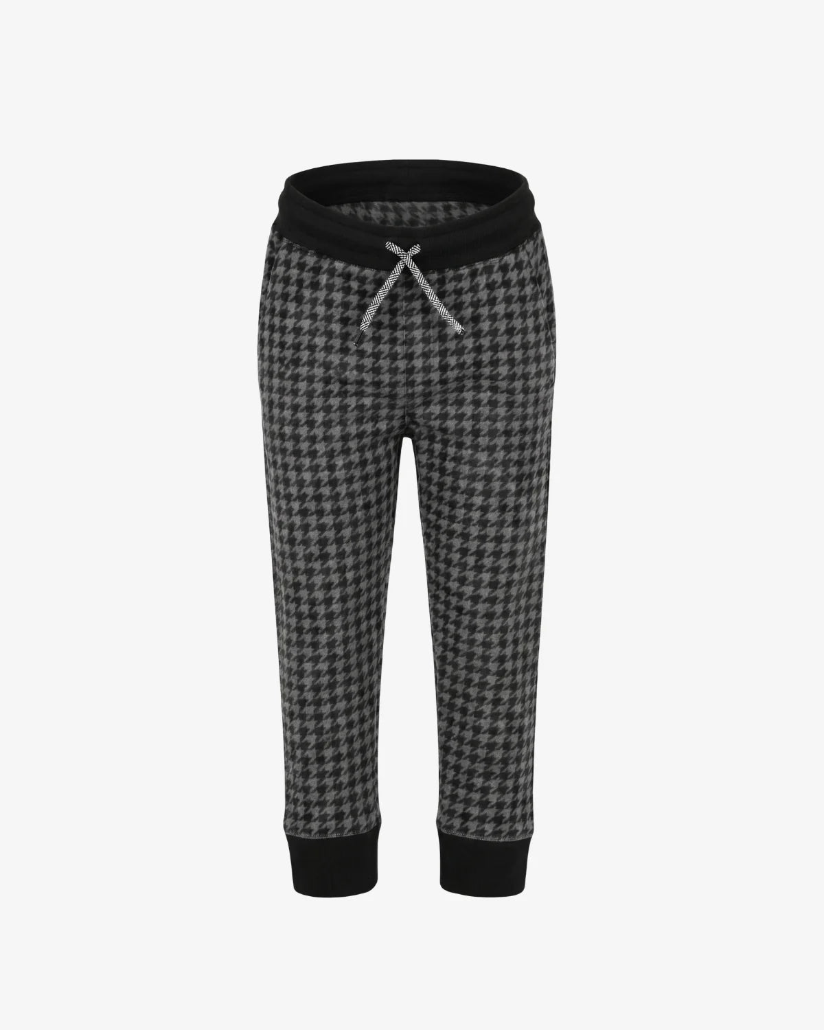 A pair of children's jogger pants featuring a black and gray houndstooth pattern, a solid black elastic waistband with a gray drawstring, and black ribbed cuffs at the ankles, shown against a plain white background.