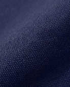 Close-up of navy blue fabric texture for Navy Blue Large Backpack, showcasing durability and quality.