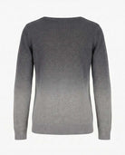 Back view of the Light Grey Ombre Kos Sweater showcasing its gradient design and cozy knit fabric.