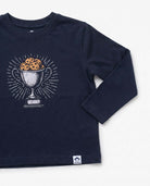 Snack Champion Graphic Long Sleeve Tee featuring a trophy filled with cookie graphics on a black shirt.