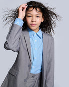 Blue Standard Button Down featured under a gray suit, perfect for children's special occasions and polished looks.