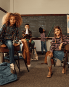 Kids in classroom wearing Lakeside Plaid Standard Button Down shirts, showcasing a fun and stylish school day.