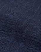 Close-up of the fabric texture for the Shadow Prince of Wales Stretchy Mod Suit in dark navy checkered pattern.