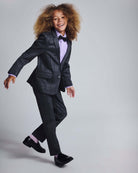 Child wearing Gentleman's Plaid Stretchy Suit Pants with a stylish suit and bow tie.