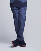 Indigo Chambray Stretchy Mod Suit Pants displayed on a model with stylish shoes.