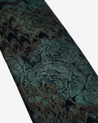 Detailed view of the Rose Camo Tie featuring a unique rose-toned camo print and crisp woven construction.