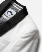 Close-up of White Tuxedo Suit Jacket featuring satin lapels and Appaman branding.