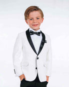 White Tuxedo Suit Jacket worn by a smiling boy, featuring satin lapels and a classic black-tie look.