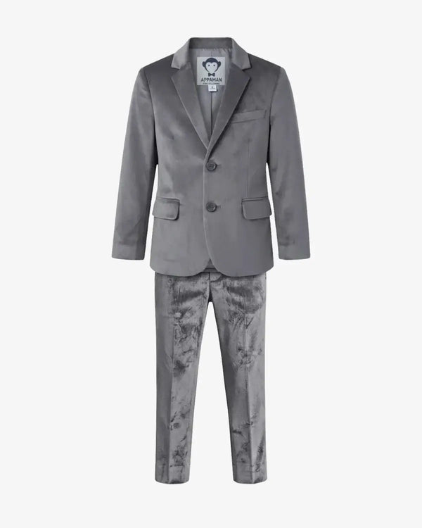 A boy's two-piece suit featuring a solid gray velvet blazer and matching gray patterned trousers, displayed on a clean white background.
